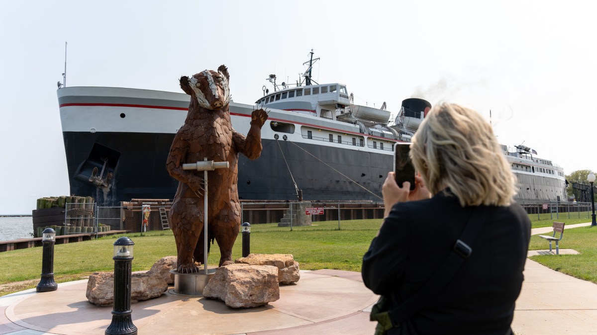a person standing in front of a building