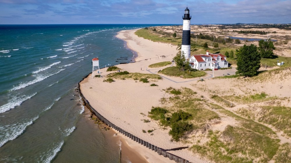 Sprawling aerial view of Ludington State Park, Big Sable Lighthouse, and Lake Michigan